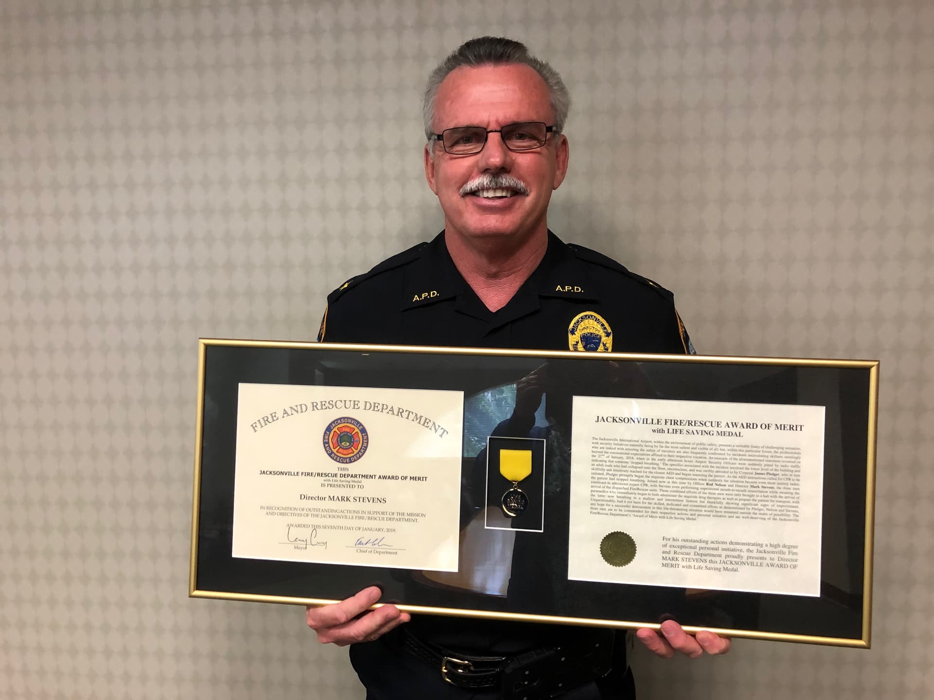 Father and son Jacksonville officers save life, receive community honor