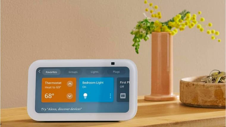 Amazon’s Custom Chips Fuel Cloud Beat, Stock Climbs to Record