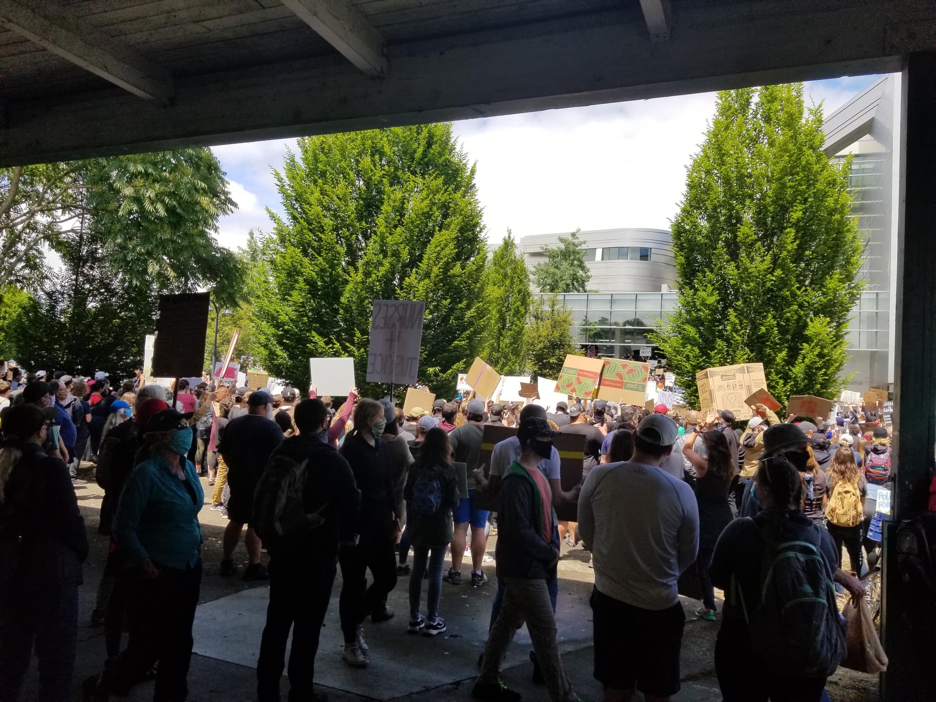 Hundreds Protest Federal Immigration Enforcement at Eugene Building