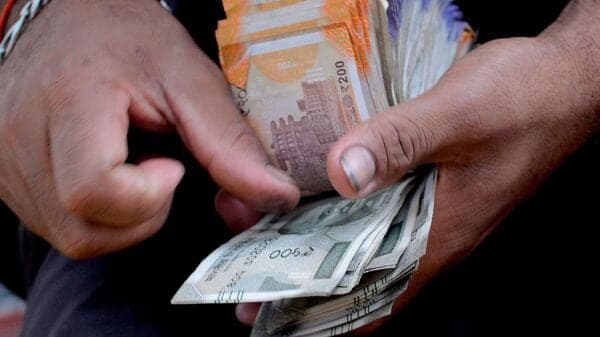 Rupee Hits Record Low, Central Bank Action Limits Deeper Slide