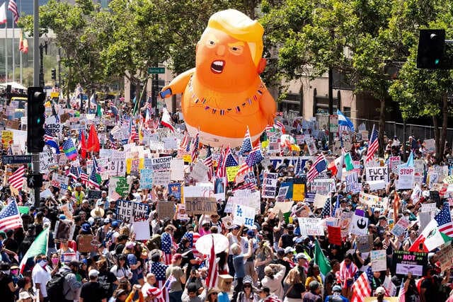 Photos Capture 'No Kings' Protests Challenging Trump’s Cross-Atlantic Influence