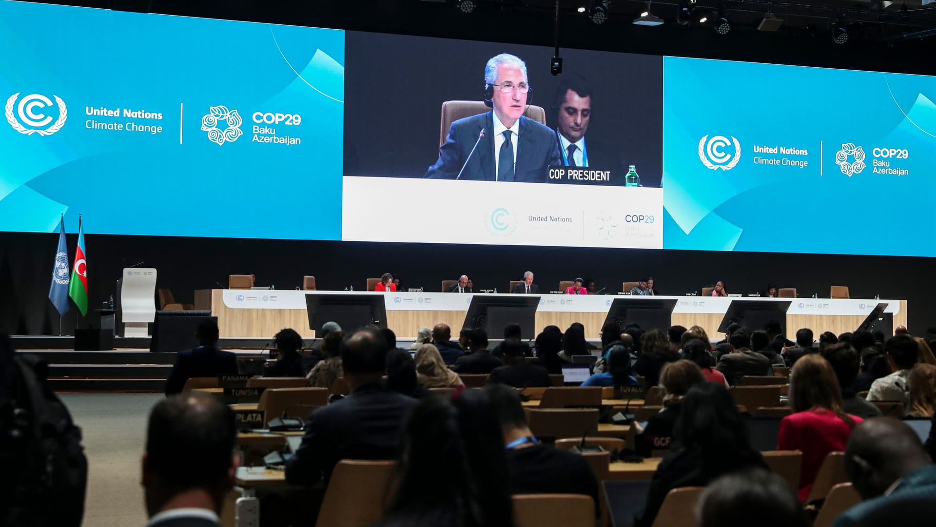 Protesters Confront Security at Main Venue of UN Climate Talks, Raising Stakes