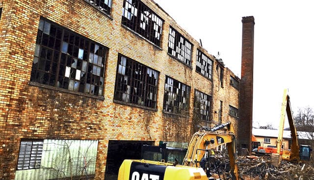 Manchester Begins Demolition of Longstanding Pants Factory on 7th Street