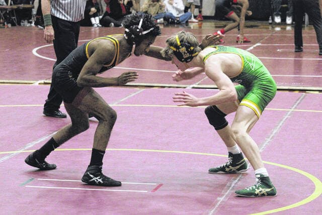 Guilford Coliseum Hosts State Wrestling Meet, Local Qualifiers Compete