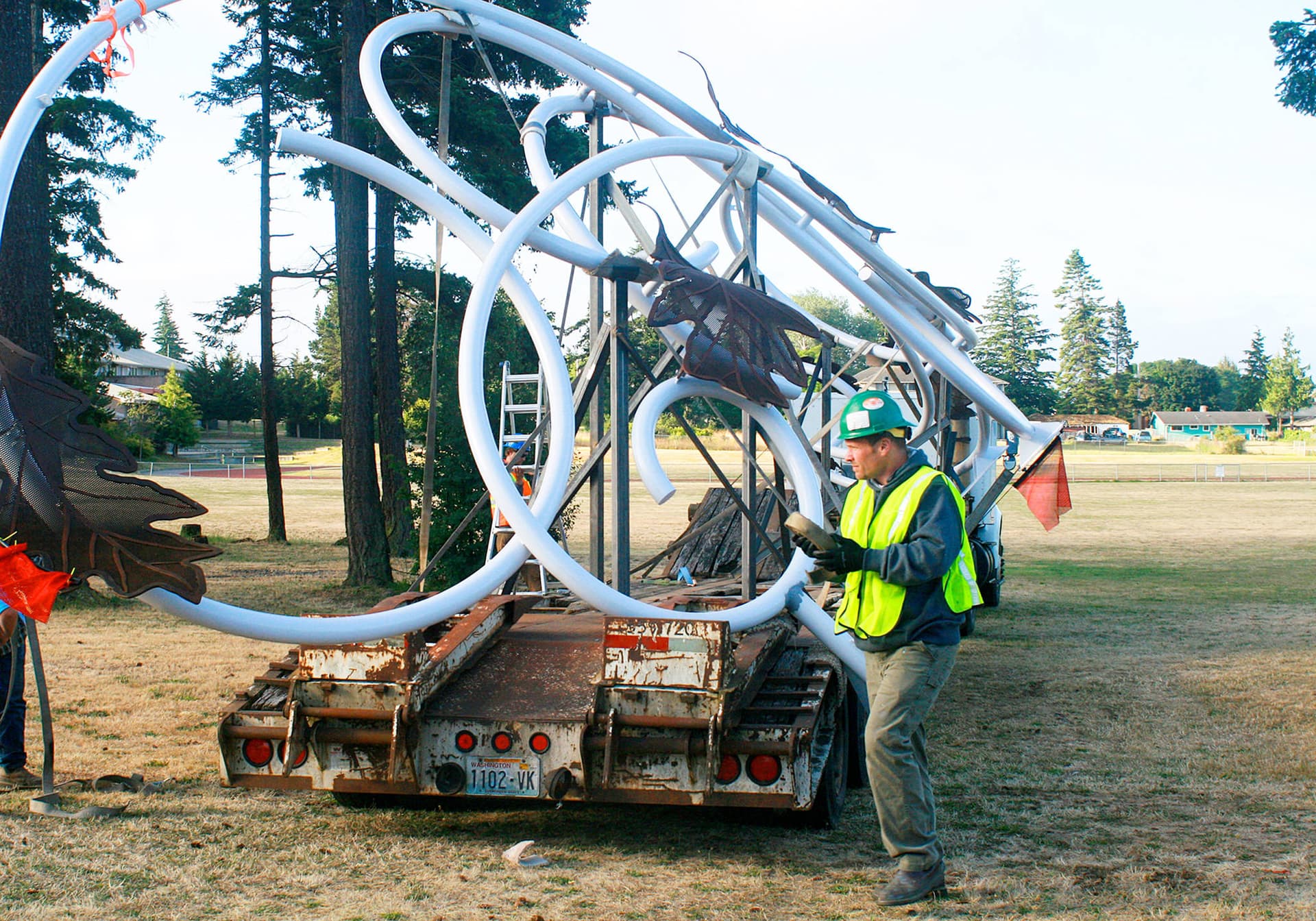 New steel "Autumn Leaves" sculpture installed along Highway 20 near school